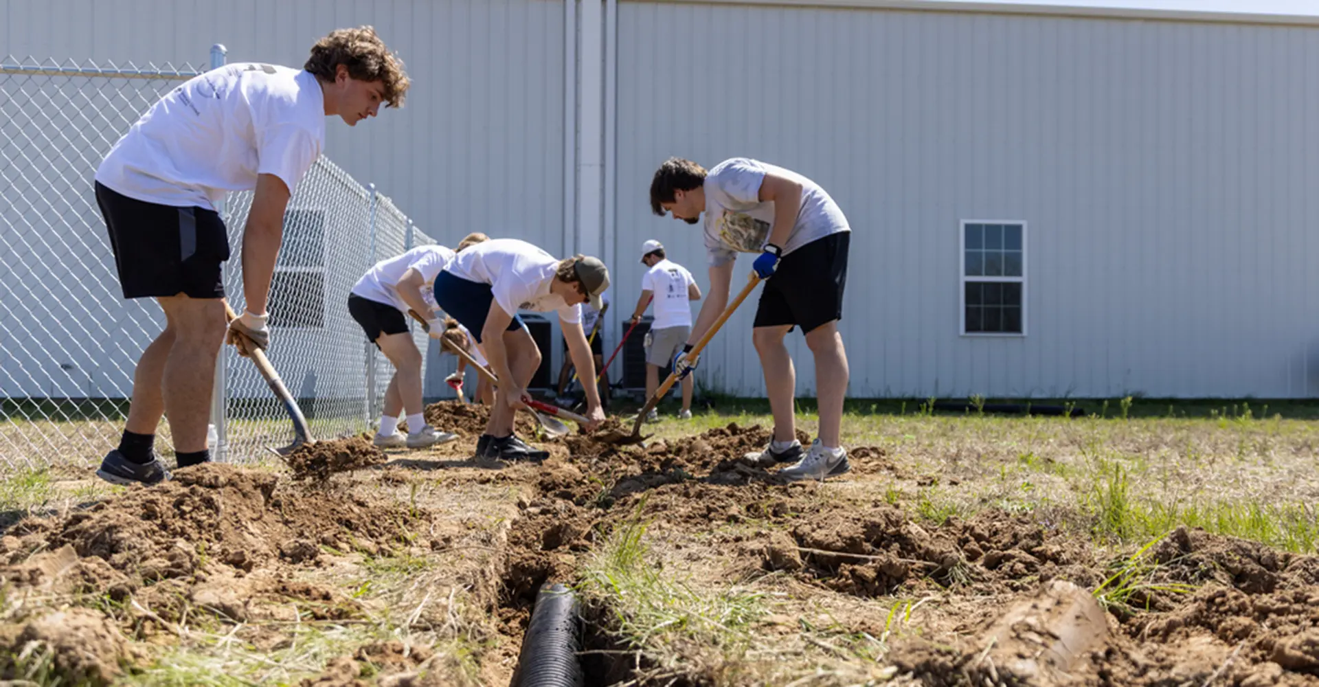 Students working together on a community charity project