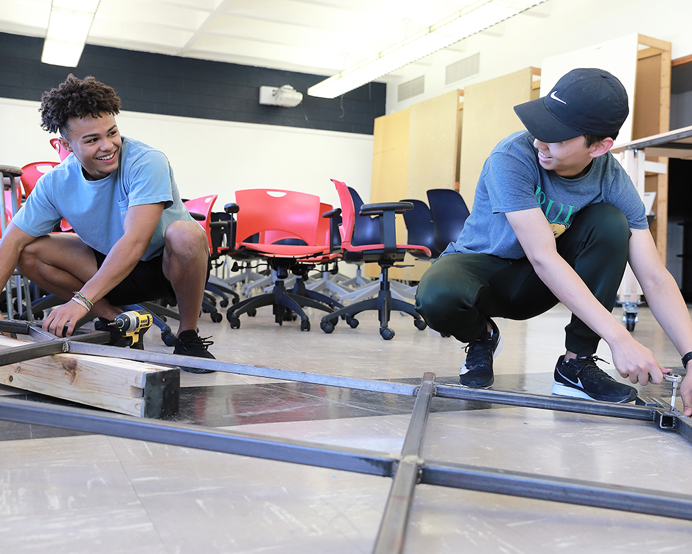 Students putting frame together