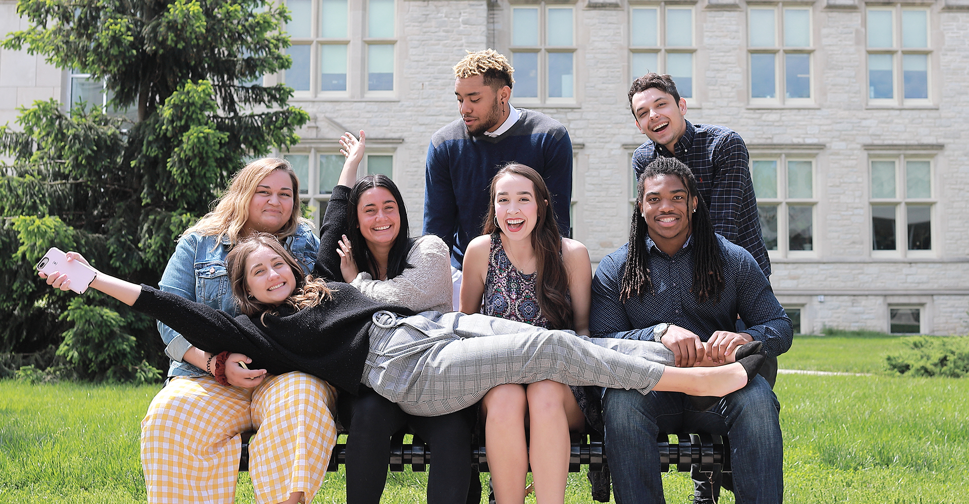 Students hanging out together outside Stanley Hall